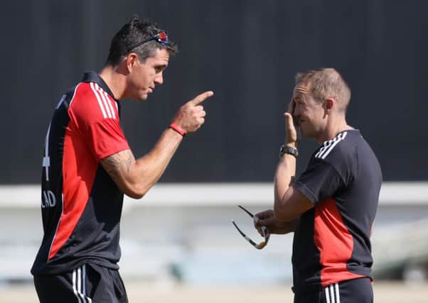 England's Kevin Pietersen (left) and coach Andy Flower.