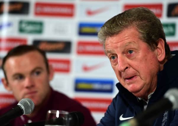 England manager Roy Hodgson with his captain Wayne Rooney.