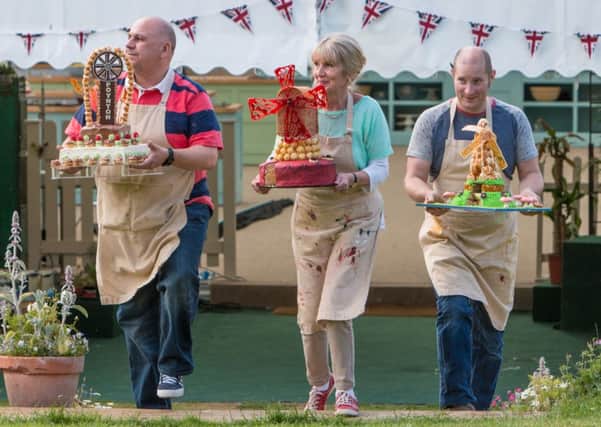 Luis Troyano (left), Richard Burr and winner Nancy Birtwhistle, who has been crowned champion of this year's Great British Bake Off