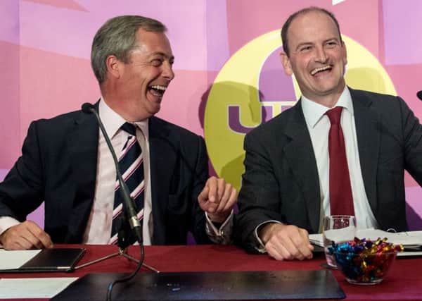 UKIP leader Nigel Farage (left) with  Douglas Carswell during a press conference