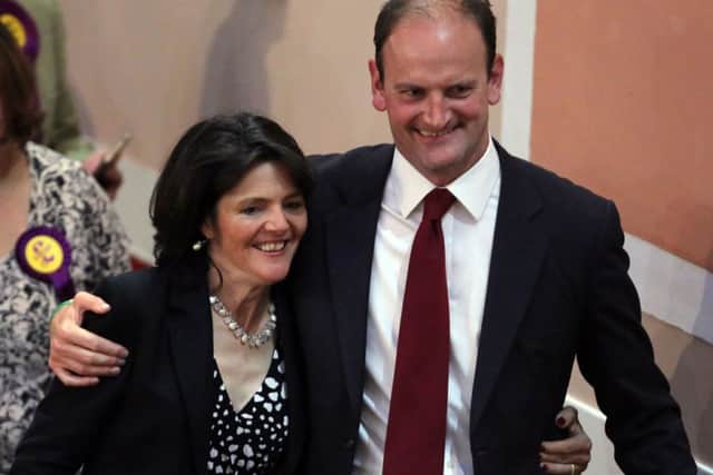 Douglas Carswell,alongside his wife Clementine after winning the Clacton constituency parliamentary by-election held at Clacton town hall in Essex