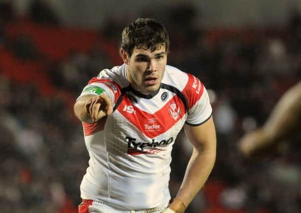 St Helens' Alex Walmsley - two years ago he was playing rugby league at Leeds Met University.