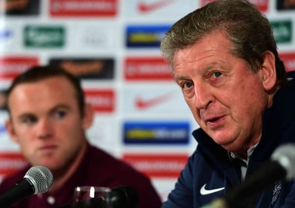 England's manager Roy Hodgson (right) with England's Wayne Rooney