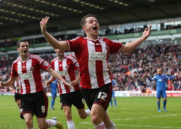 Marc McNulty scores Sheffield United's second goal.