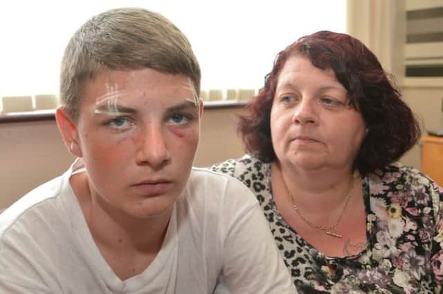School assault victim Rhys Larkings and his mother Lorraine