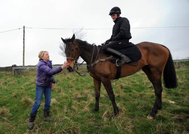 Sue Smith with Mr Moonshine on Bingley Moor in April this year. Picture: Simon Hulme.