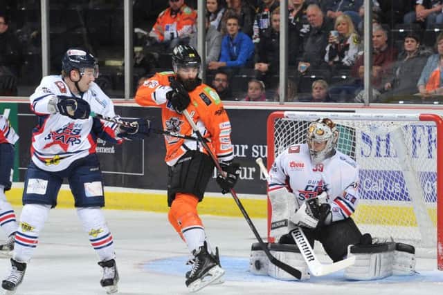 Sheffield Steelers' Mathieu Roy makes a nuisance of himself in front of the Dundee Stars' net during Wednesday night's 6-3 victory. Picture: Dean Woolley.