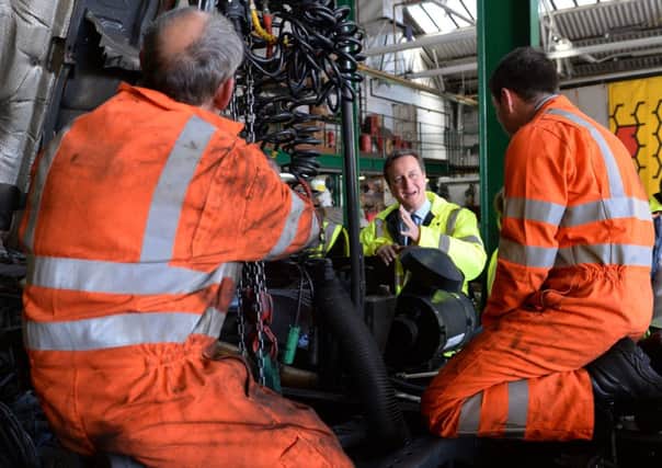 Prime Minister David Cameron meets staff at  Swain Group haulage company in Strood, Kent today where he was campaigning for the forthcoming Rochester and Strood by election
