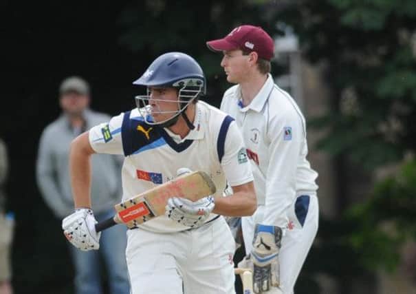 Will Rhodes hits out during his century for the Yorkshire Acadamy against Doncaster