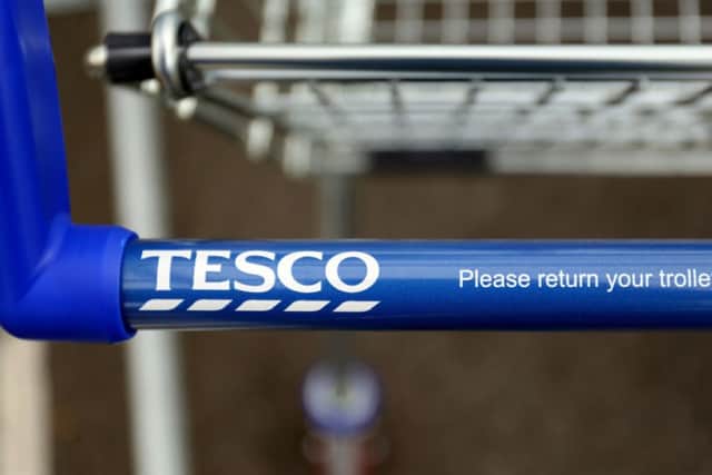 Tesco has unveiled reduced profits