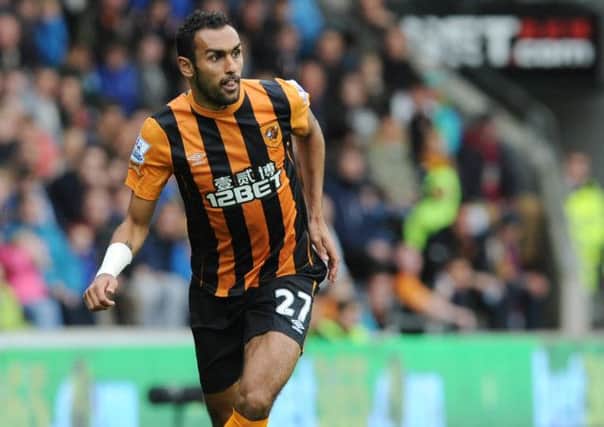 Ahmed Elmohamady is back for Hull City at Arsenal.