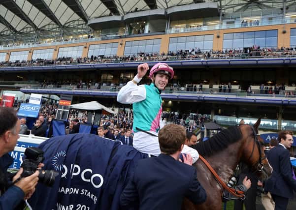 James Doyle, on Noble Mission, celebrates after beating Al Kazeem to win the British Champion Stakes  at Ascot (Picture: PA).