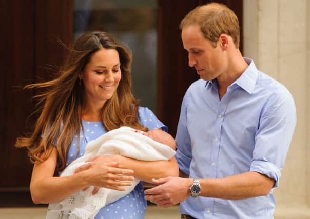 The Duke and Duchess of Cambridge leaving the Lindo Wing of St Mary's Hospital in London, with their newborn son Prince George