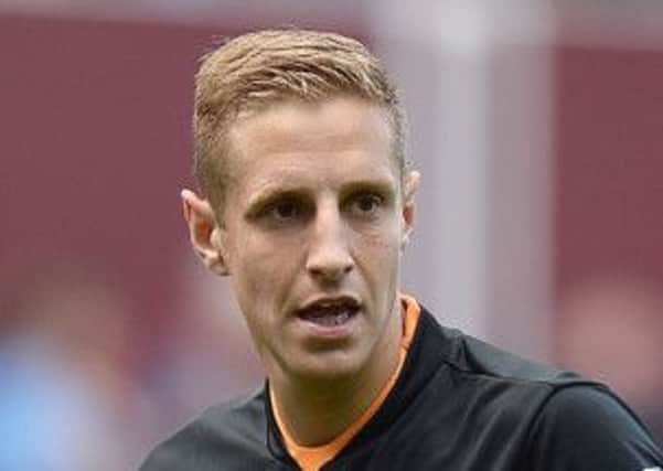 Hull City's Michael Dawson was off the field with a damaged ankle when Arsenal equalised late on.