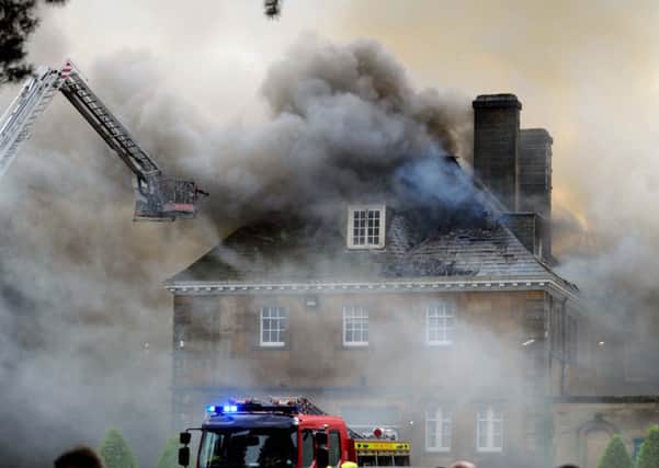 Firefighters tackle the blaze at Crathorne Hall, Yarm...1001918c..1st October 2014 ..Picture by Simon Hulme