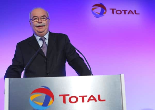 The CEO of French oil giant Total SA was killed when his corporate jet collided with a snow removal machine