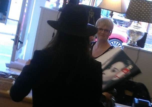 Lady in black: Catherine Zeta Jones shopping in Whitby