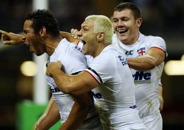 Brett Ferres, right, in action for England during last year's World Cup.