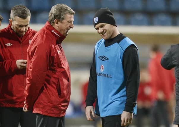 England manager Roy Hodgson (left) and Wayne Rooney.