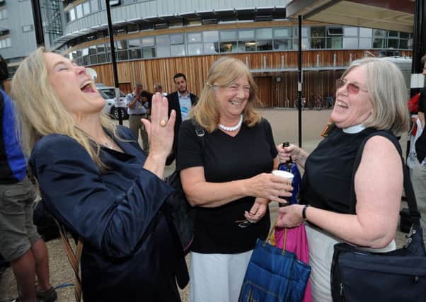 Women celebrate the decision on the induction of Women Bishops at the Church of England General Synod in York last July.