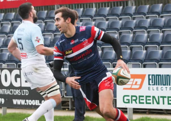 DEBUT DELIGHT: Doncaster Knights Sam Wilson crosses to score on his trial period debut from Hull Ionians against Bedford Blues. Picture: L Pickersgill