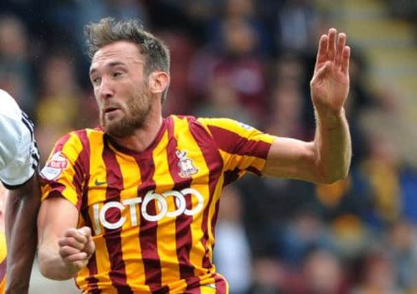 Bradford City's Rory McArdle saw red at Oldham.