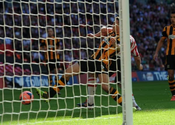 Jose Baxter, partially obscured, scores for Sheffield United against Hull City in the FA Cup semi-final, the first Blade to score at the new Wembley (Picture: Martyn Harrison).