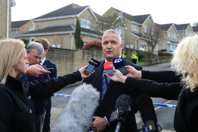Detective Superintendent Simon Atkinson speaks to the media during a press conference at the scene in the Clayton area of Bradford