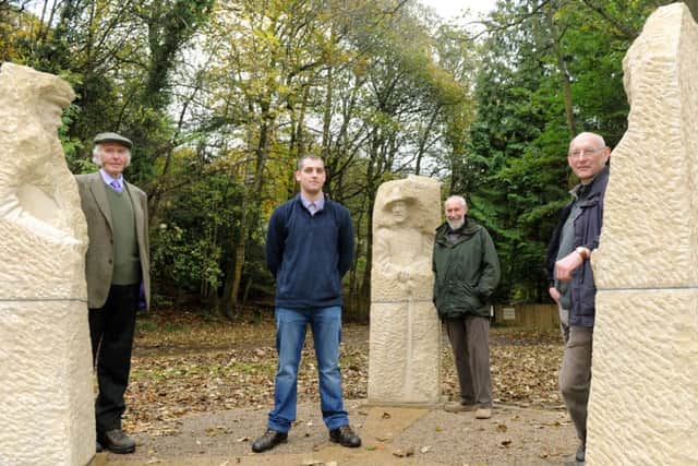 Joseph Hayton (second left) with his sculptures based on farmer John Rayner (left), former miner Paul Reinsch (centre) and his father John Hayton (right).