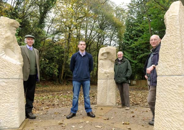 Joseph Hayton (second left) with his sculptures based on farmer John Rayner (left), former miner Paul Reinsch (centre) and his father John Hayton (right).