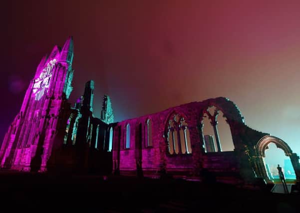 Whitby Abbey in North Yorkshire is floodlit as it takes part in its annual illumination.