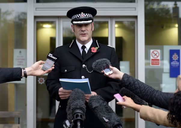 Surrey Police Assistant Chief Constable Stuart Cundy makes a statement outside Guildford Police Station, after John Lowe was convicted of the murders of Christine and Lucy Lee.