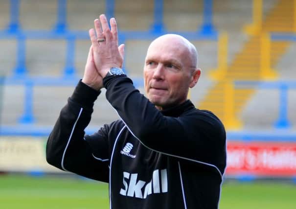 Neil Aspin's FC Halifax Town will face Bradford City in front of the television cameras.