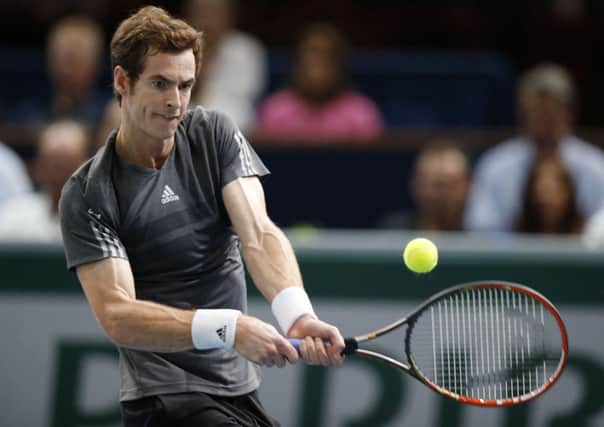 Britain's Andy Murray returns on his way to beating Grigor Dimitrov, of Bulgaria, in Paris (Picture: Michel Euler/AP).