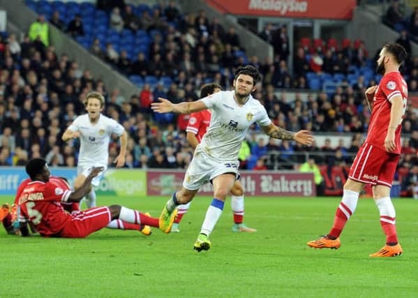 Leeds United's Alex Mowatt turns and celebrates after scoring the first goal for Leeds. (Picture: James Hardisty).