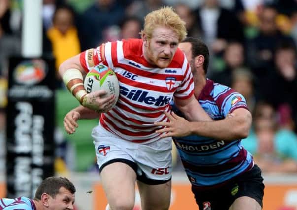 DRIVING FORCE: England forward James Graham goes on a rampaging run against Australia and will be looking to punch holes in the Kiwis defence on Saturday. Picture: photosport/sw pix