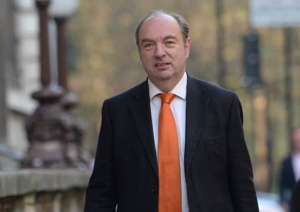 Former Home Office Minister Norman Baker arrives at Liberal Democrat offices in Westminster