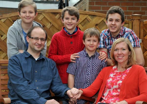 Caroline Kimberling who suffered a heart attack while at the Vue Cinema with two of her sons, pictured with husband Daniel, and from back left sons Tim, aged 12, Josh, 14,  Zach, 10, and Ben 7. See Ross Parry copy RPYMOVIE : A mum-of-four who was at the cinema with her young children when her heart STOPPED beating was miraculously saved after a nurse watching the film rushed to her aid.  Caroline Kimberling, 36, was watching the trailers with her two sons Zach, 10, and seven-year-old Ben, before the children's film the House of Magic started, when she went into cardiac arrest.  Brave Zach, who had been chatting to his mum, ran into the lobby of Vue Cinema in York, North Yorks., to raise the alarm when she became unresponsive. The commotion caused during the 10:30am kids' club screening, drew the attention of a nurse and physiotherapist, who, by chance, were in the cinema with their children. The pair, along with a member of staff trained in first aid, rushed to her aid and are credited with saving her life by