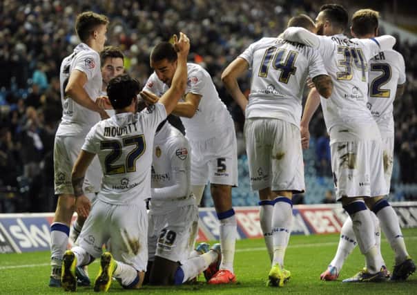 SECOND STRIKE: Alex Mowatt celebrates his second goal with Leeds United team-mates but it did not bring Charlton to their knees as the game ended 2-2. Picture: Bruce Rollinson.