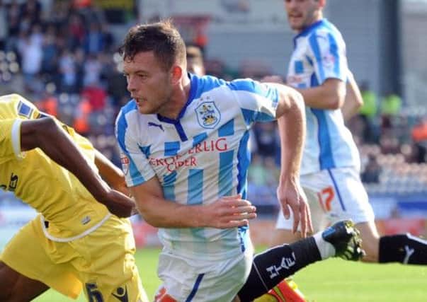 Huddersfield's Harry Bunn scored for Town but they lost 3-2 at Derby County.
