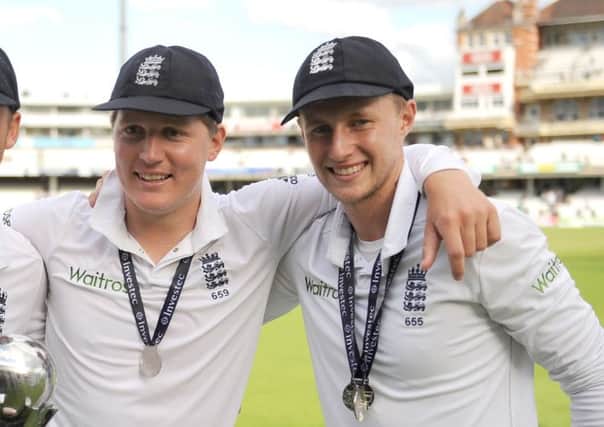 Yorkshire's Gary Ballance (centre) and Joe Root, right.