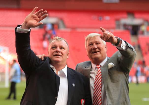 DRIVEN: Rotherham United manager Steve Evans, left, and chairman Tony Stewart.