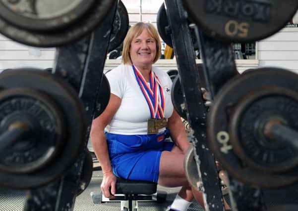 62-year-old world champion power lifter Sue Hollands