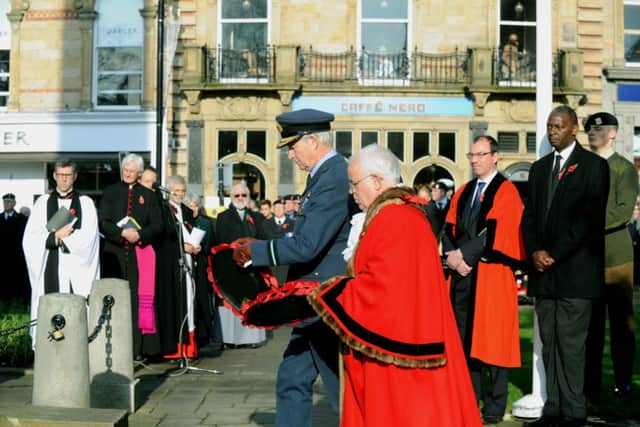 09/11/14 The Mayor of Harrogate Coun Jim Clark lays a  poppy  wreath at the cenotaph in Harrogate on  Remembrance Sunday  .    (GL1003/98m)