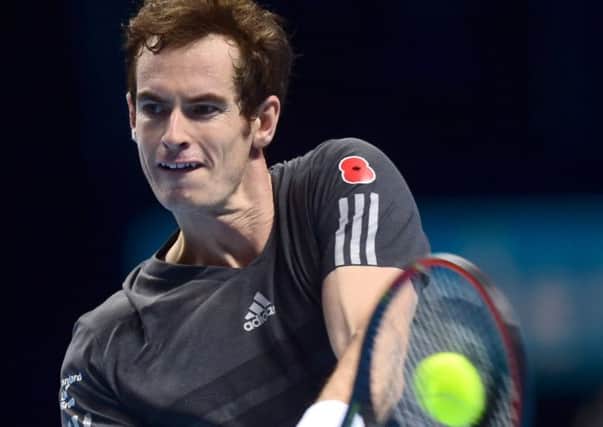 Great Britain's Andy Murray in action against Japan's Kei Nishikori during the Barclays ATP World Tour Finals at The O2 Arena, London.