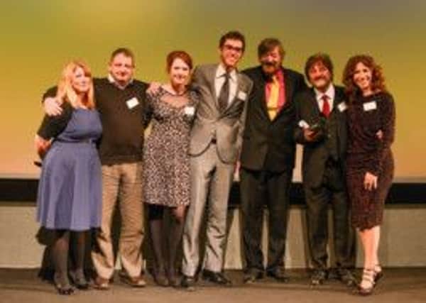 Anti-stigma campaigner and Emmerdale script adviser Lawrence Butterfield, second right, at the Mind media awards 2012. He is pictured with members of the Emmerdale cast and crew and awards host Stephen Fry.