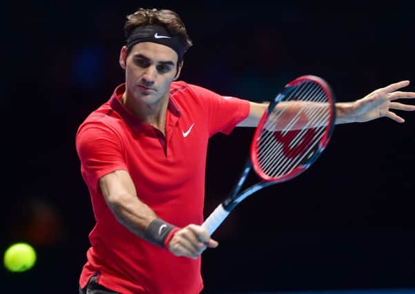 Switzerland's Roger Federer in action against Japan's Kei Nishikori