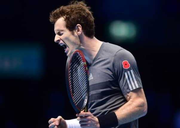 Great Britain's Andy Murray reacts against Canada's Milos Raonic