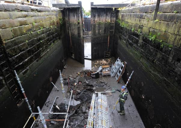 The Canal and River Trust carry out maintenance on the lock at Thornes in Wakefield.