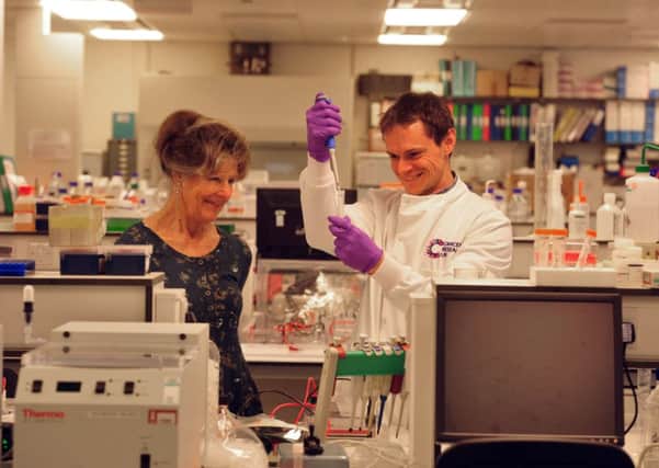 Artist Shirley Ross with researcher Dr Tim Palmer in the  Leeds Cancer Research UK Centre at St James's Hospital.
Picture: Tony Johnson